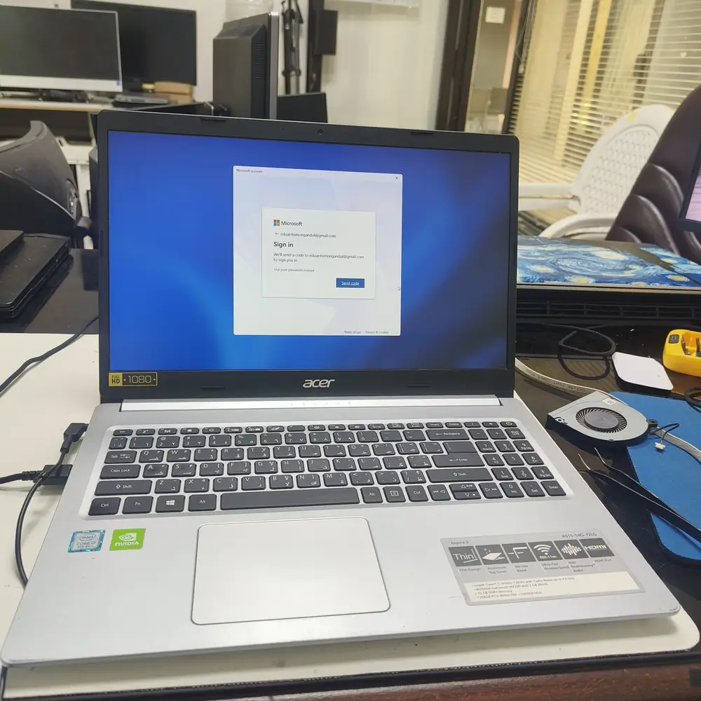 An Acer laptop displaying the Windows sign-in screen