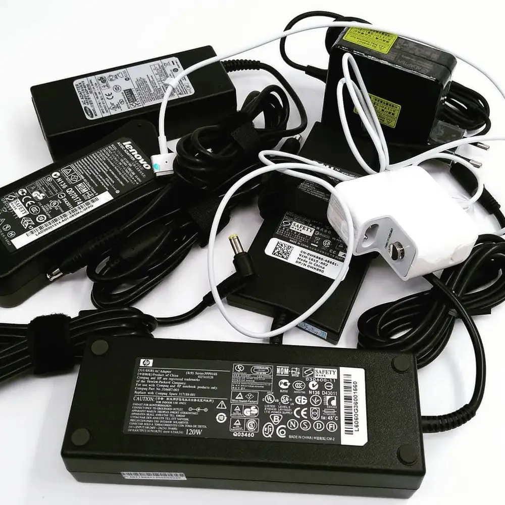 Assorted Laptop Power Adapters Collection