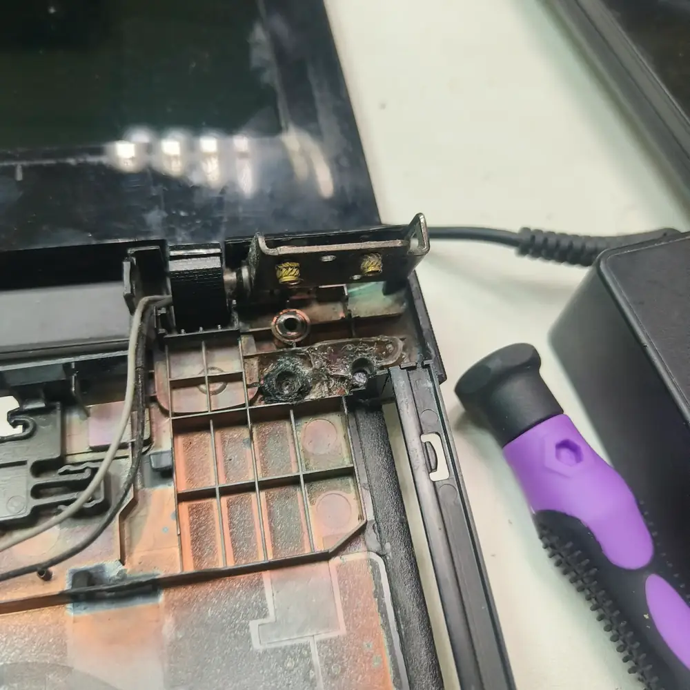 Broken laptop hinge chassis damage