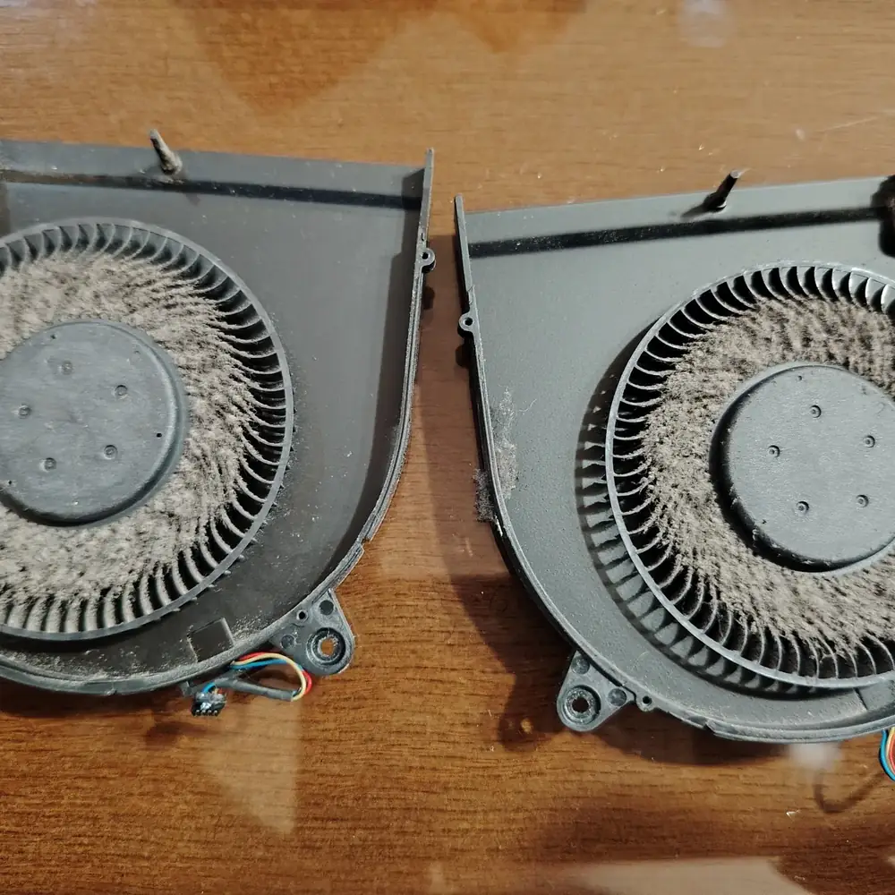 Dusty laptop cooling fan replacement