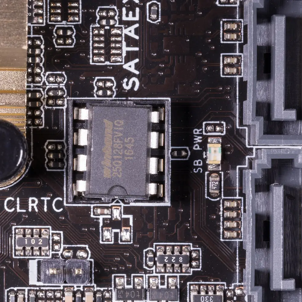 Physical DIP-8 SPI Flash BIOS ROM chip seated on a computer motherboard
