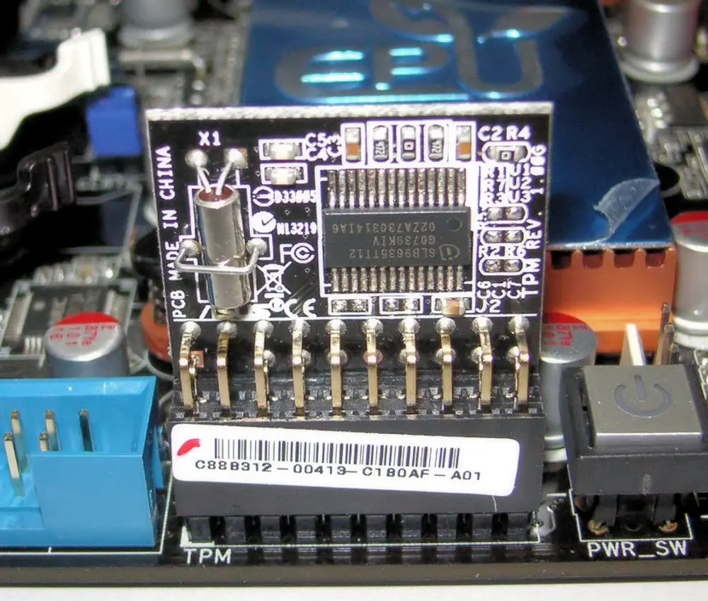 Hardware security chip on a circuit board representing TPM, Secure Boot and BitLocker