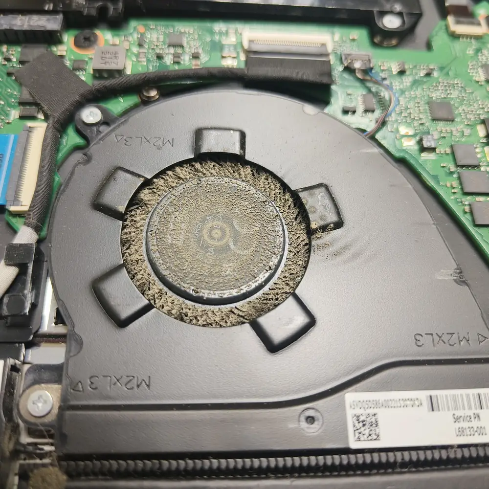 Laptop Fan Dried Thermal Paste Residue